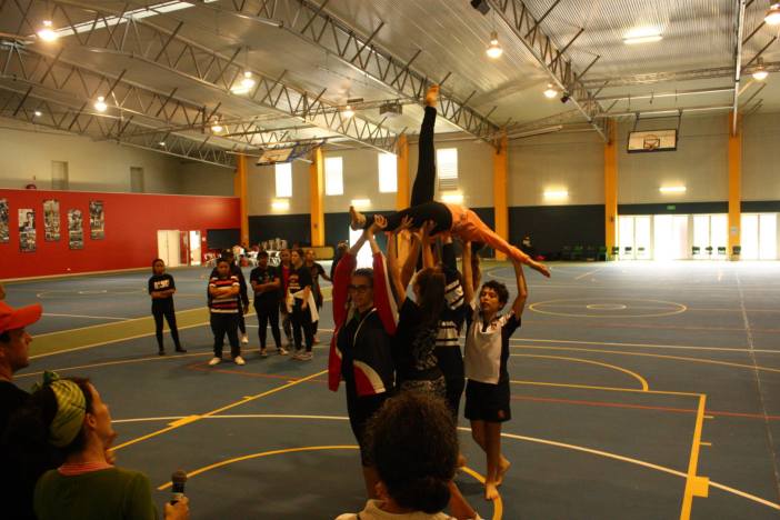 High schoolers being choreographed by hip-hop artist Morganics